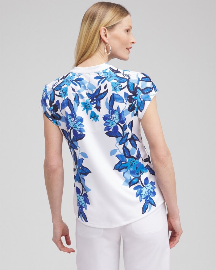 Chicos Zenergy UPF Floral Cap Sleeve Polo - Intense Azure Chicos Zenergy UPF Floral Cap Sleeve Polo - Intense Azure